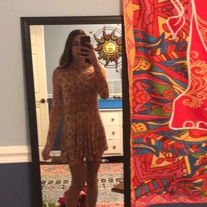 Orange and white patterned mini dress